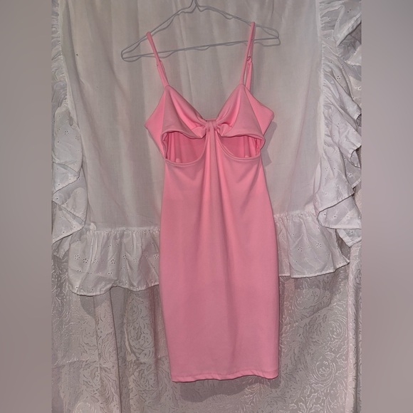 Bright Pink Body Con Spaghetti Strap Dress w/ cut outs and adjustable straps. - Picture 1 of 5